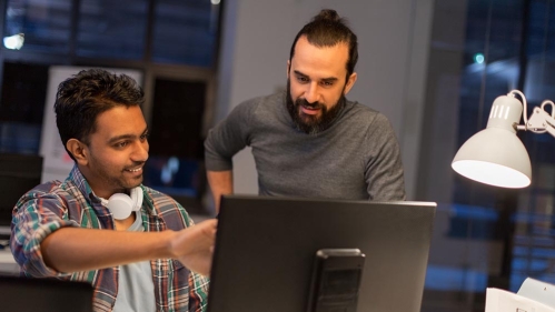 Data Science - two men at a computer screen